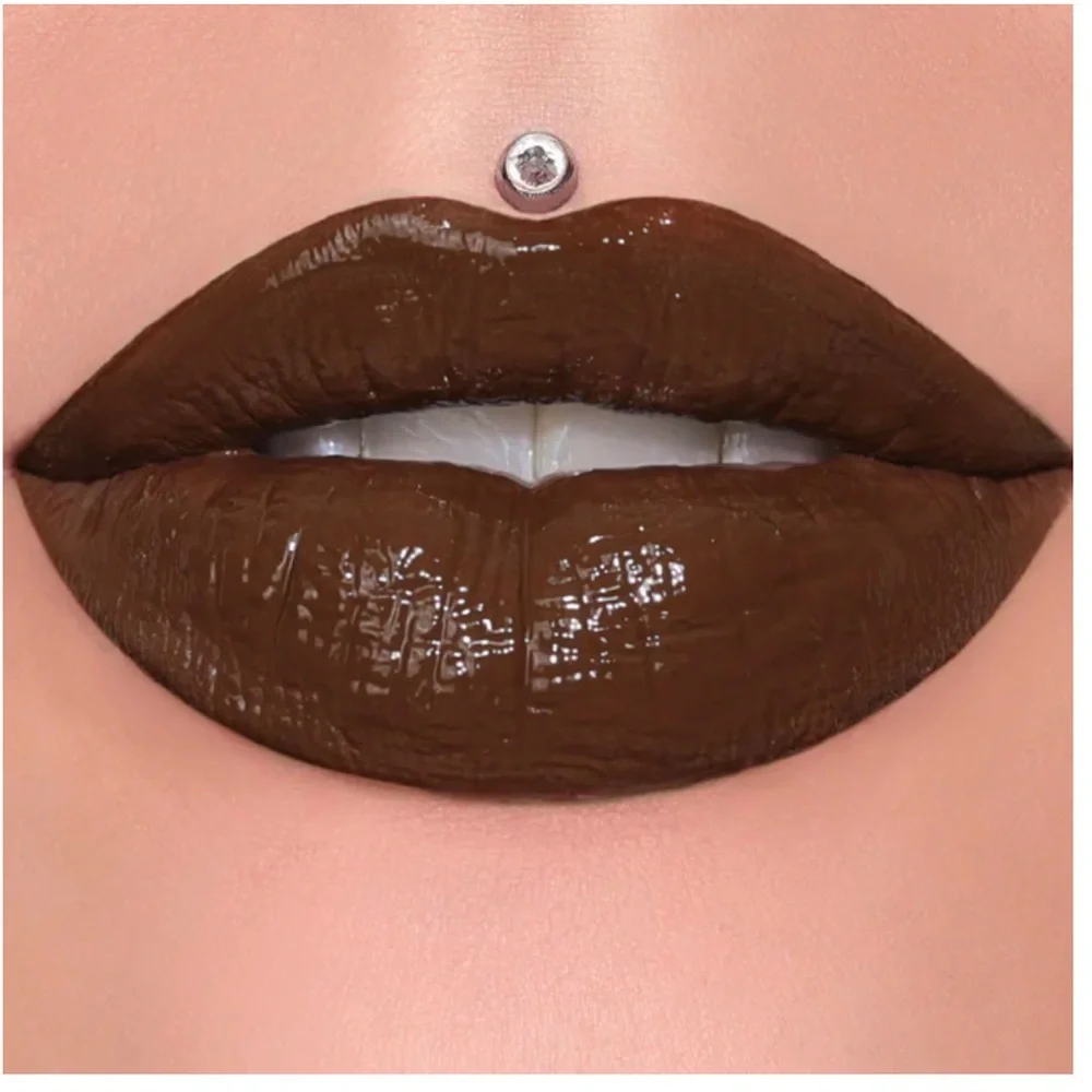 97. Jeffree Star DOMINATRIX Supreme Gloss Dark Brown Lip Gloss